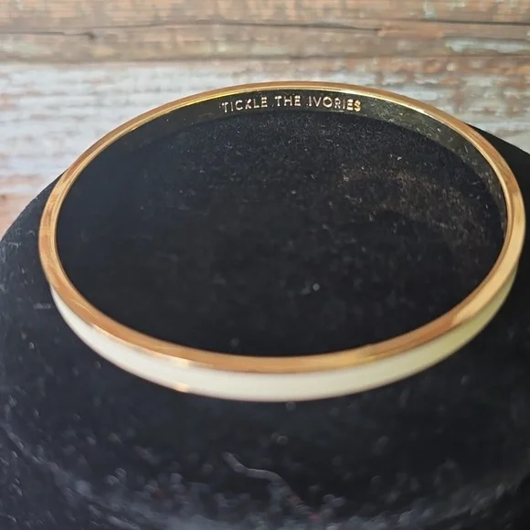 kate spade "Tickle The Ivories" Gold Tone Thin Bangle with Pink Drawstring Pouch - Picture 2 of 4